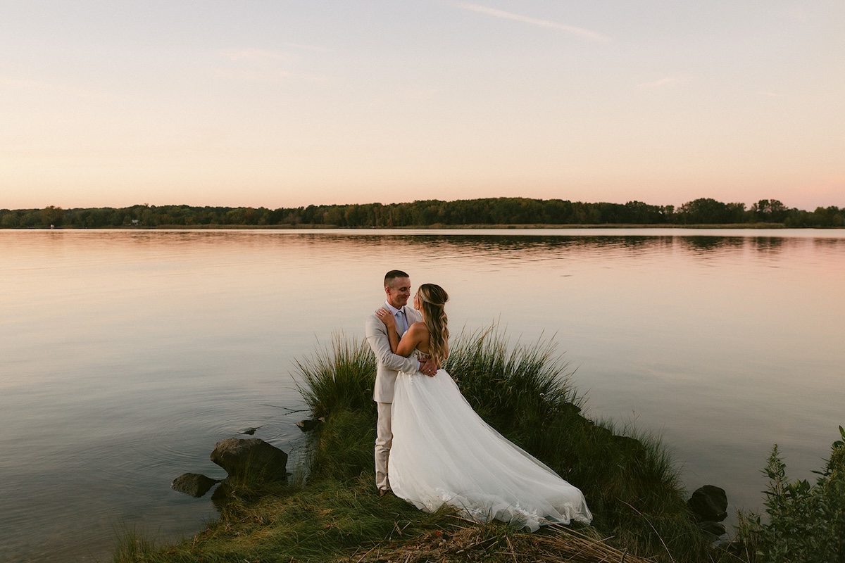 Kenzie and Garrett portrait on the riverfront at their private estate wedding in Centreville, MD. Planning by Hannah Belle Events