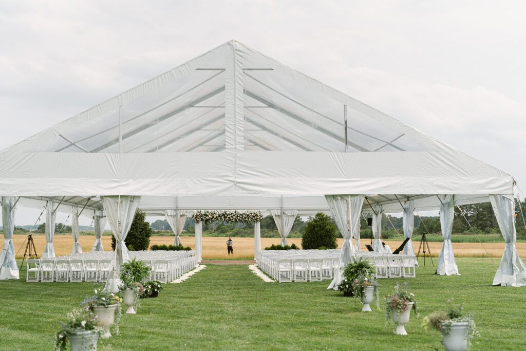 Ceremony cleartop frame tent at Kent Island Resort for a spring wedding